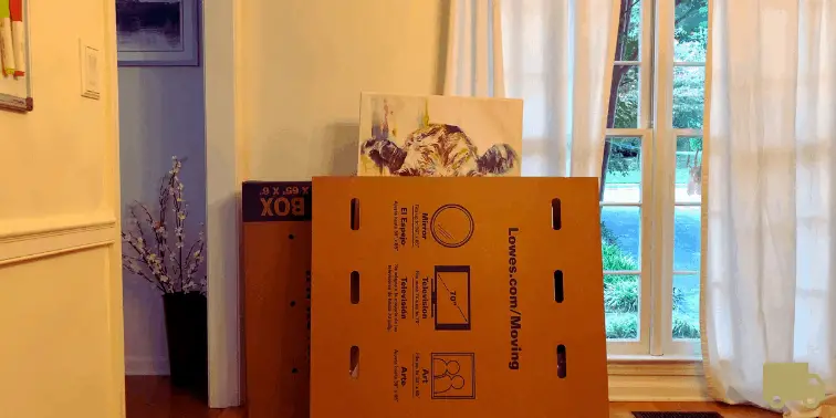 Artwork packed in a TV Moving Box