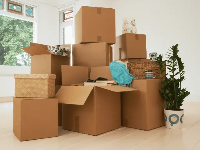 Stack of Boxes Inside an Empty Home