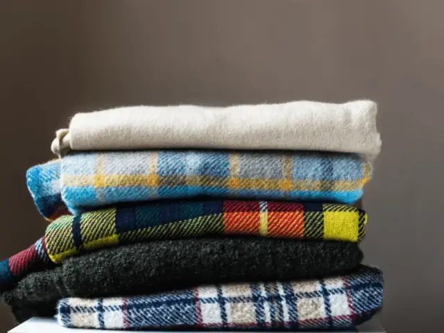 Organize Your Blankets Into Stacks