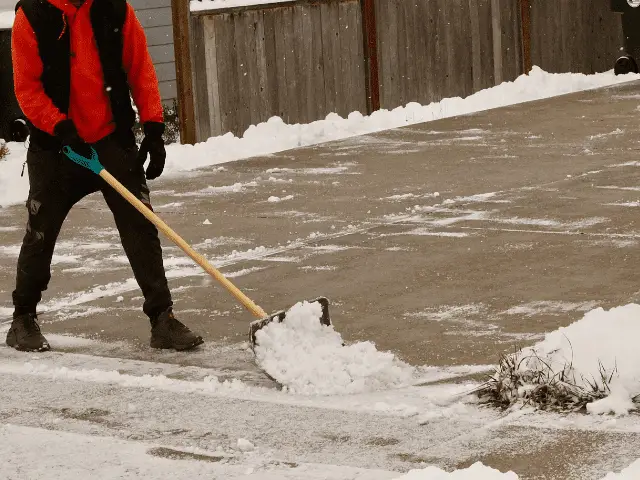 Shoveling Snow off a Driveway