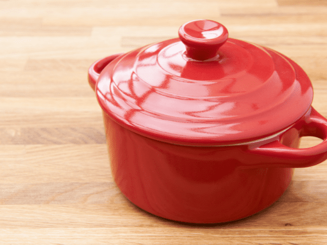 Red Casserole Dish on Wooden Surface