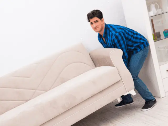 One Person Trying to Move a Couch