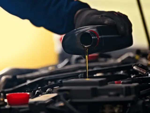 Oil Being Poured Into Engine